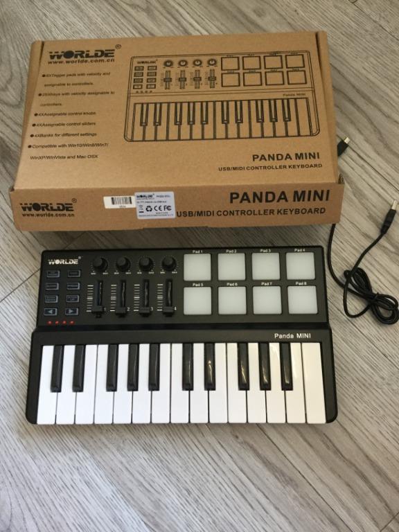 Worlde panda mini portable 25 keys usb keyboard midi controller with outlet colorful drum pad