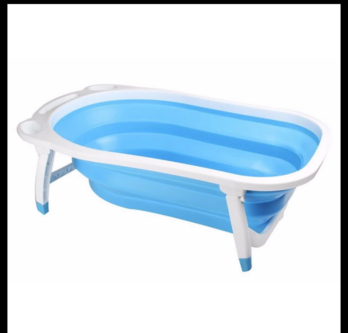 Foldable Portable Modern Baby Bath Tub (Category: Bathtub & Bath Accessories) located in Quezon City. Submitted by liz.ty (Listing ID 1001300660, Image 1). Description: Available colors: Blue & Green Foldable Bath Tub Age: Newborn & Up Made of safe & non-toxic plastic Foldable & Portable Drainage Plug Great space saver Size: 85 x 52 x 25cm Made of safe & non-toxic plastic materials Adjustable plastic - no need for tub nets Built in hook for stora