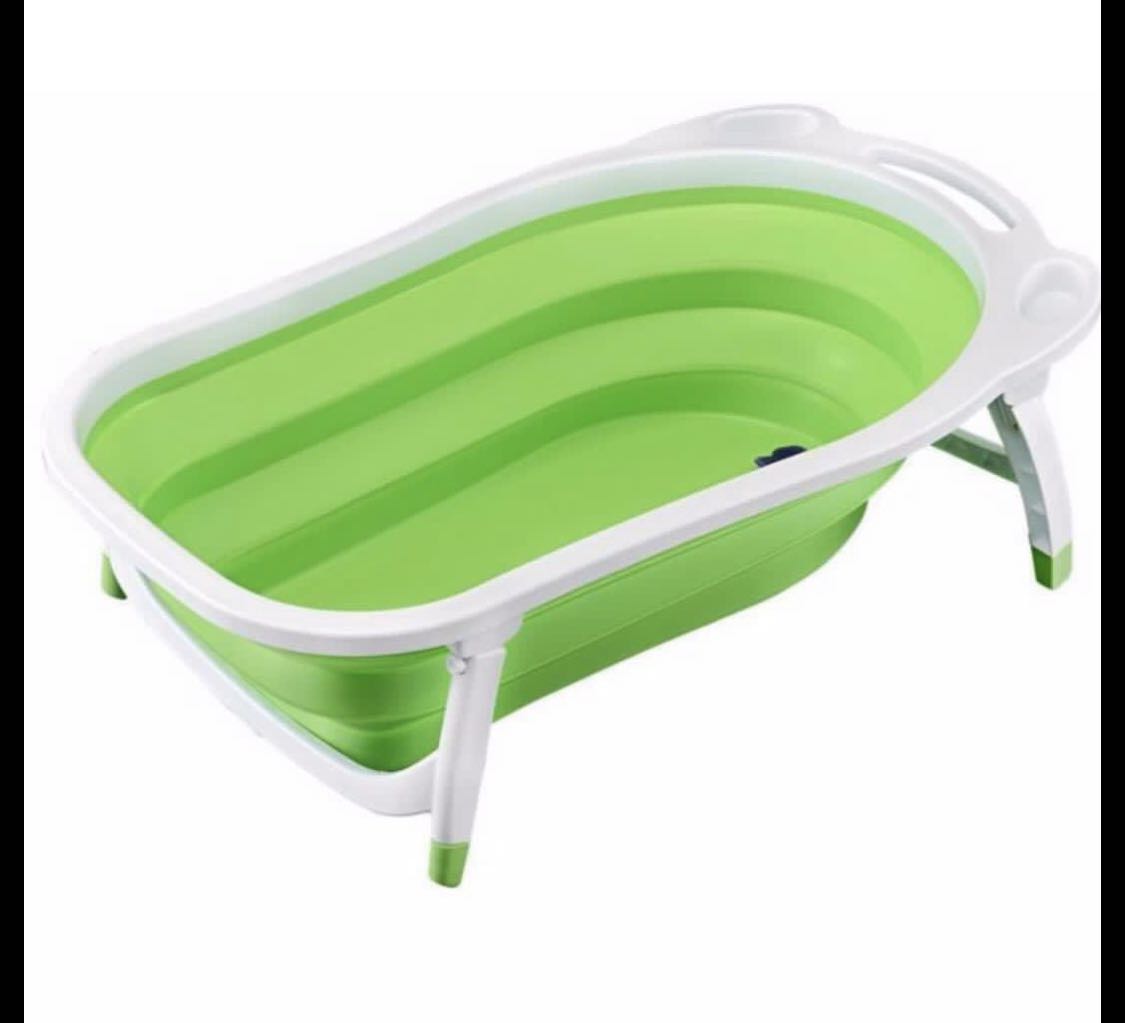 Foldable Portable Modern Baby Bath Tub (Category: Bathtub & Bath Accessories) located in Quezon City. Submitted by liz.ty (Listing ID 1001300660, Image 2). Description: Available colors: Blue & Green Foldable Bath Tub Age: Newborn & Up Made of safe & non-toxic plastic Foldable & Portable Drainage Plug Great space saver Size: 85 x 52 x 25cm Made of safe & non-toxic plastic materials Adjustable plastic - no need for tub nets Built in hook for stora