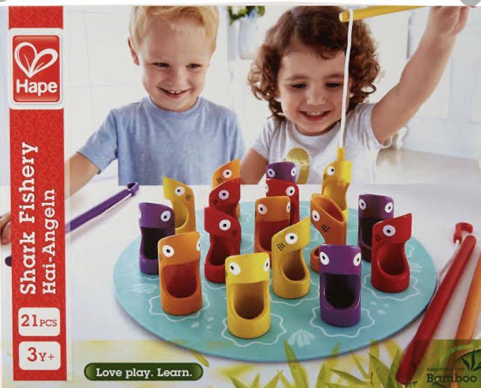 Hape Shark Fishery (Category: Board Games & Puzzles) located in Quezon City. Submitted by disco_10 (Listing ID 1001360058, Image 1). Description: Original Hape brand A Bamboo material board game This unique and 21-piece game includes 4 different fishing poles and a variety of colorful sharks Promotes creativity, logic, and problem solving Non-toxic finishes and child safe materials.