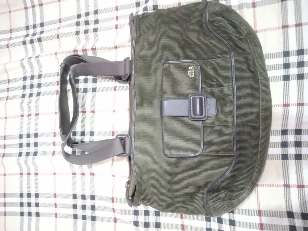 Lacoste Bag (corduroy) (Category: Cross-body Bags) located in Marikina City. Submitted by len_cat (Listing ID 1001287124, Image 1). Description: REPRICED! 500.00 Lacoste Corduroy Bag Moss green Needs cleaning inside Pls see last picture (handle)-nag mark sa pagkakasabit shipping c/o buyer.