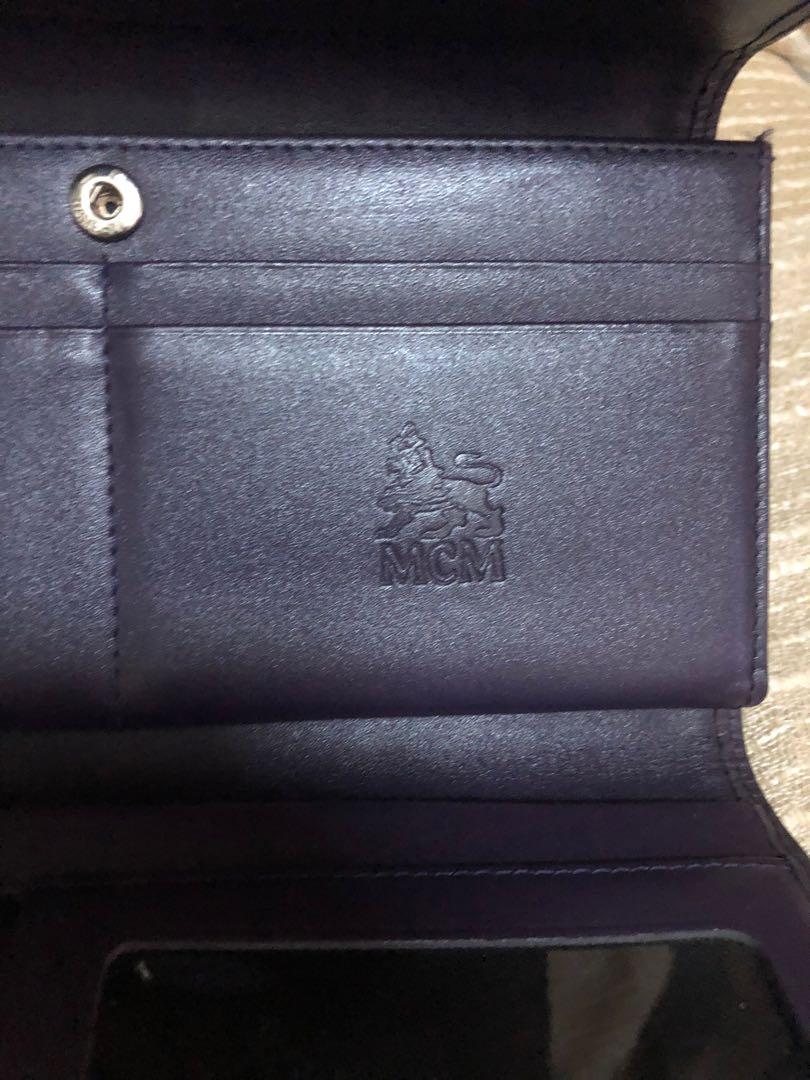 Original MCM wallet (Category: Luxury Bags & Wallets) located in Manila. Submitted by edifier888 (Listing ID 1001552478, Image 2). Description: In very good condition with 10 card slots and multiple bill pockets.