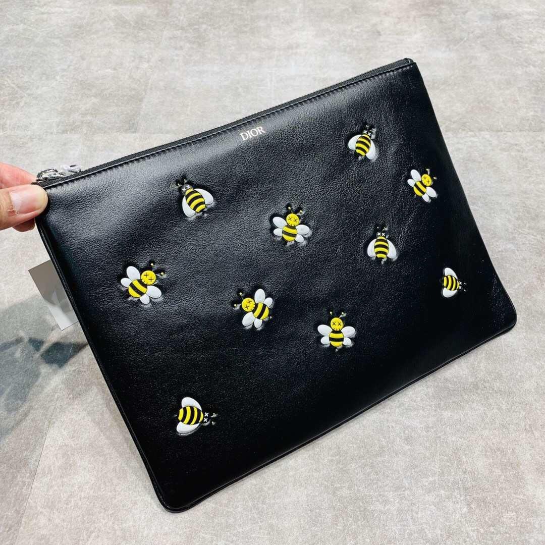 Dior x Kaws Clutch, Luxury, Bags & Wallets on Carousell