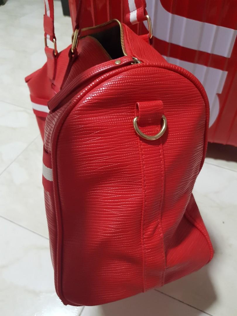 Supreme x lv duffle bag price clearance