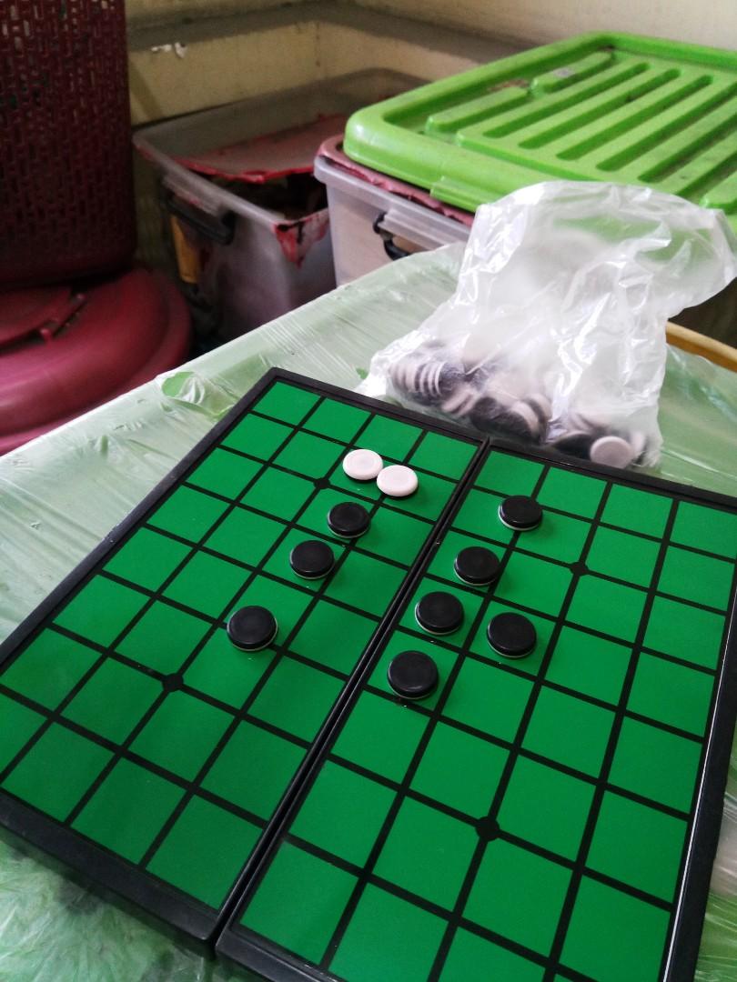 Magnetic Othello board with chips (Category: Board Games & Puzzles) located in Manila. Submitted by daisythejane (Listing ID 1002063695, Image 1). Description: Othello board game with black/white chips Mode of payment : Bdo, bpi or gcash Shipping via grab, lalamove or courier of choice c/o buyer #inManila #inQC #inPasig #inMakati #inParanaque.