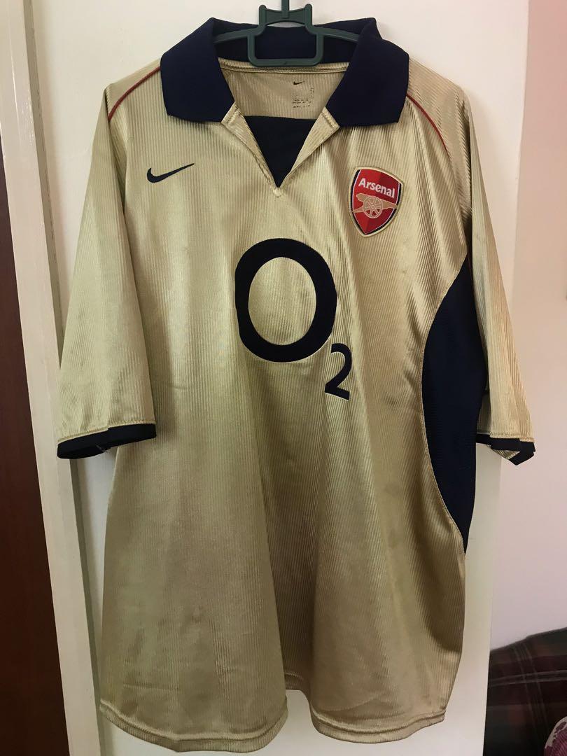 Arsenal shop gold shirt