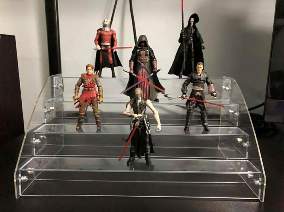 Acrylic riser for toy display (Category: Figurines & Statues) located in Quezon City. Submitted by dmnhobbies (Listing ID 242475826, Image 2). Description: For sale: - LIMITED STOCKS - 4 Tier - Good for OOB Funko - Good for 3.75" Figures - Good for 1/64 Die Cast Cars Dimesions: Height - 6" Length - 12" Width - 7" Width per Tier - 1.5".