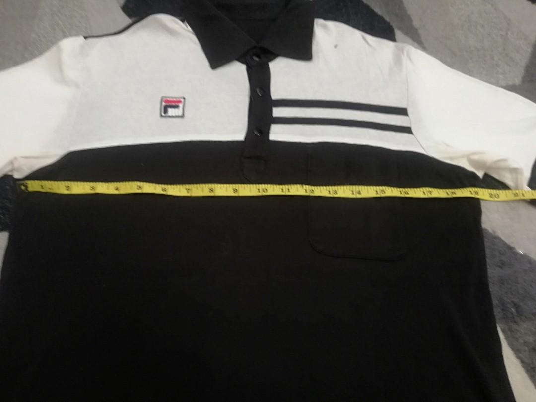 Fila snapbutton (Category: Tshirts & Polo Shirts) located in Bagan Serai. Submitted by amirasraf511 (Listing ID 1002535780, Image 3). Description: Fila black&white snapbutton Pit : 19 inch Length : 26.5 inch Tag faded/missing Price are negotiable, offer your price.