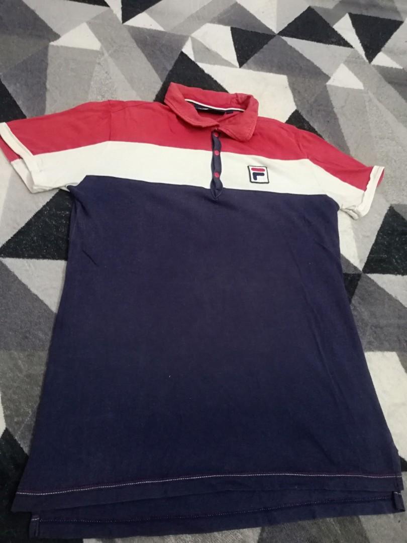 Fila snapbutton (Category: Tshirts & Polo Shirts) located in Bagan Serai. Submitted by amirasraf511 (Listing ID 1002537639, Image 1). Description: Pit : 17.5 inch (stretchable) Length : 26 inch Born in Italy Condition 8/10.