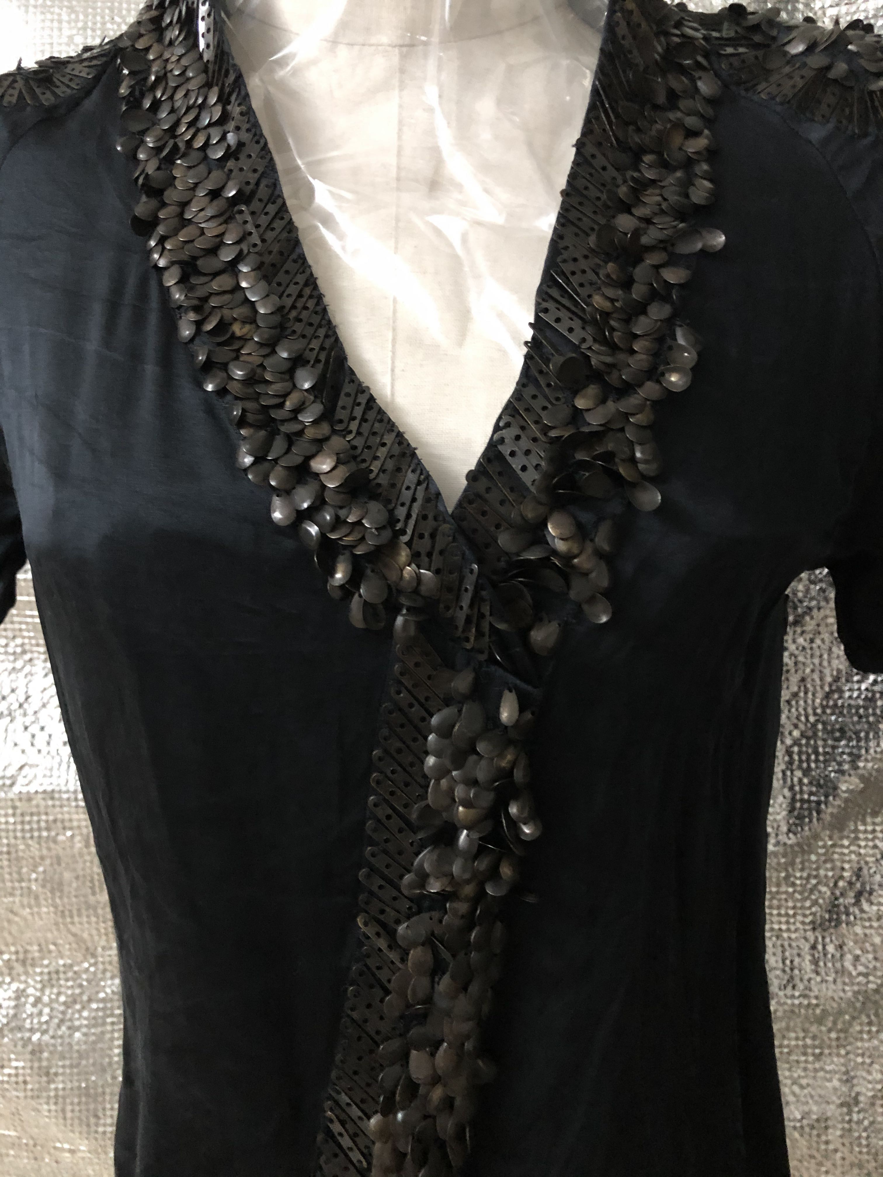Armani black silk top with heavy sequins on shoulder and packets (97% new)