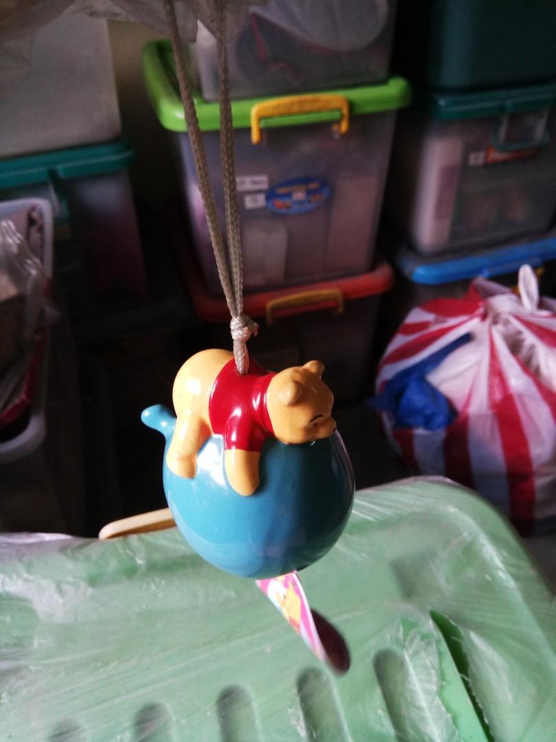 Pooh bear wind chime (Category: Designer & Blind Box Toys) located in Manila. Submitted by daisythejane (Listing ID 1002791920, Image 1). Description: Poor bear on a Balloon wind chime Mode of payment : Bdo, bpi or gcash Shipping via grab, lalamove or courier of choice c/o buyer.