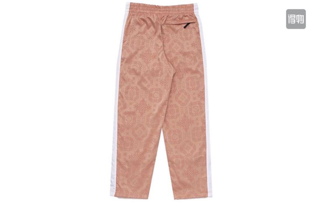 nike rose gold track pants