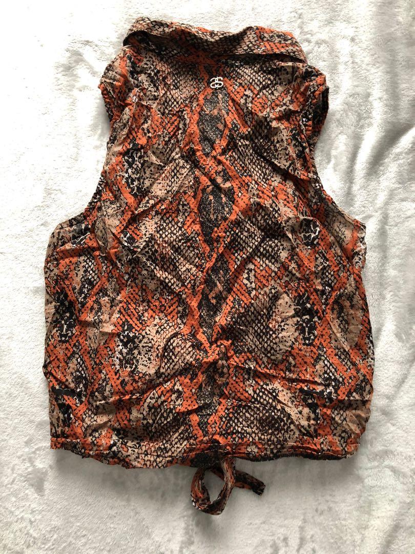 STUSSY SNAKE PRINT TOP (Category: Women's Clothes) located in Melbourne. Submitted by lov32buy (Listing ID 1003449307, Image 3). Description: Great condition Button tie top Thin polyester material Size 8 ❤️ Pls check out my other listings. Selling everything (most in excellent/brand new condition) at a very cheap price.