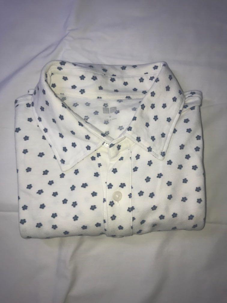 Uniqlo Printed Polo Shirt (Category: Tshirts & Polo Shirts ) located in Manila. Submitted by ffinds (Listing ID 1003522299, Image 1). Description: Uniqlo Printed White Polo Shirt Great condition Size Medium 21W x 28L can be shipped via lbc/lalamove/j&t.