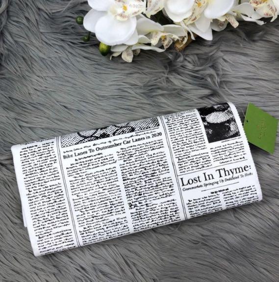 Kate spade glitzy sales ritzy newspaper clutch