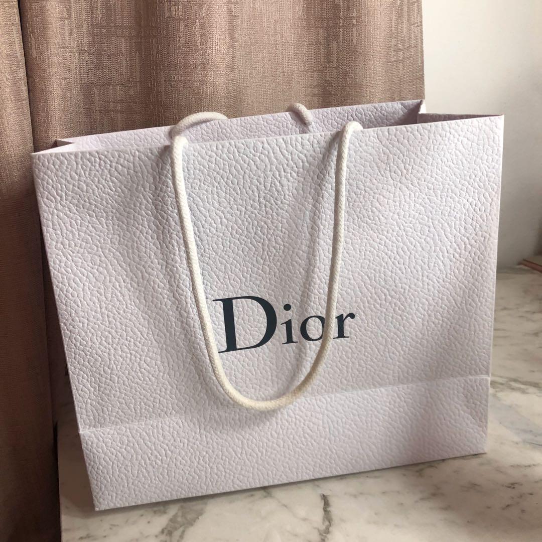 Dior paper bag - decorative (Category: Accessories) located in Bronte. Submitted by luxecloset1 (Listing ID 1003752556, Image 1). Description: .