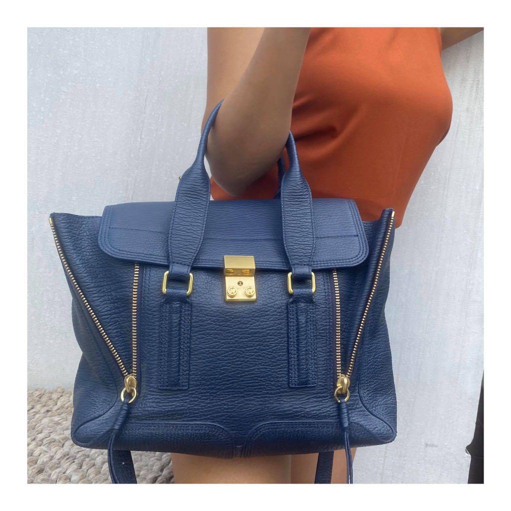 Authentic Phillip Lim Medium Pashli (Category: Luxury Bags & Wallets) located in Pasig City. Submitted by sibsmnl (Listing ID 1005446908, Image 2). Description: * 100% authentic or your money back * Color: Ink * Pre-loved * With signs of usage * With complete cards * Perfect size * Very durable * Ranking: 8 out of 10 * MOP: BPI, Security Bank, GCash * SF care of buyer Message us for more pictures. #louisvuitton #lv #givenchy #prada #philliplim #m