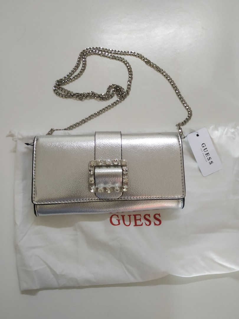 guess silver clutch bag