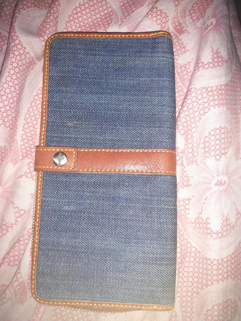 denim leather long wallet (Category: Luxury Bags & Wallets) located in Rizal. Submitted by simplygoodthingsmel (Listing ID 1005651085, Image 1). Description: good as new..with a little signs of usage...denim..leather combination.....fixed price.