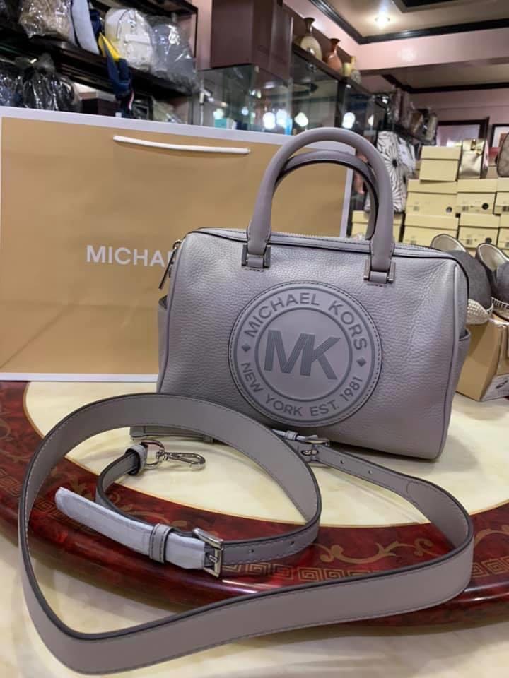 Mk 2 way bag (Category: Luxury Bags & Wallets) located in Paranaque City. Submitted by FLess.ph (Listing ID 1005757147, Image 2). Description: Clearance !! 8800 + SF !! Comes with MK paper bag and Gift Receipt! #authentic #dealsafely.