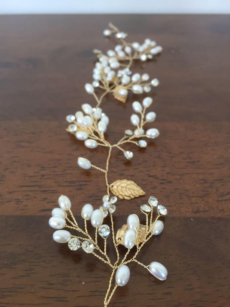 Wedding/Bridal Hairpiece Accessory (Category: Hair Accessories) located in Quezon City. Submitted by cesinn (Listing ID 1005647487, Image 1). Description: Exquisite hairpiece bought in Frankie & Friends General Store in SM Aura. Used it once on my wedding day. Letting it go because we’re decluttering and would love for it to find a new owner ❤️ Approx 14 inches long.