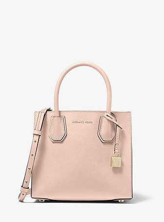 Mercer medium studded leather accordion crossbody bag discount