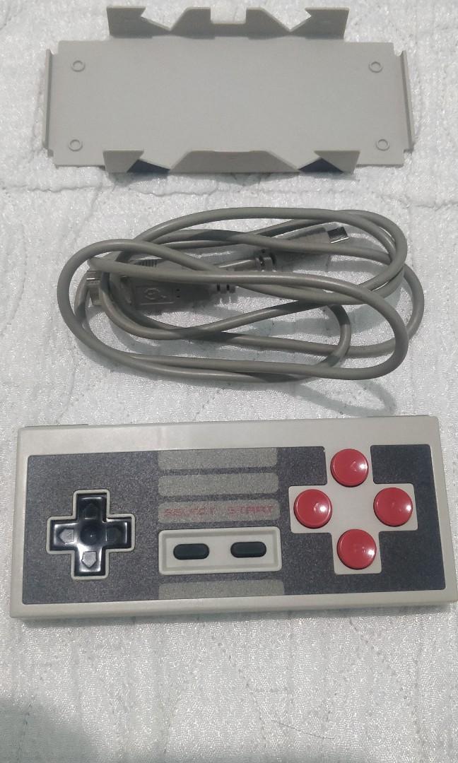 8Bitdo NES30 Controller (Category: Controllers) located in Davao. Submitted by komorebi.konbini (Listing ID 1005871973, Image 1). Description: Original 8Bitdo NES30 Controller with phone stand (wired/bluetooth) for Windows, Mac, Android & IOS. No issues, barely used.