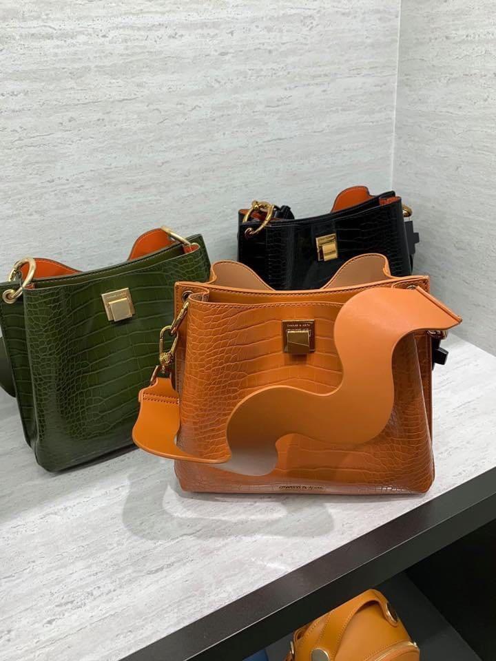 Charles and Keith Croc effect bucket shoulder bag, Luxury, Bags