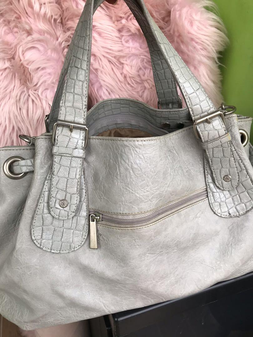 Dima Borsa 2-way bag (Category: Luxury Bags & Wallets) located in Bacoor. Submitted by cleanupthecloset (Listing ID 1006274110, Image 2). Description: Dima borsa 2 way bag with sling Large Gray croc skin No flaws Meet up molino or lalamove metromanila cavite or laguna c/o buyer.