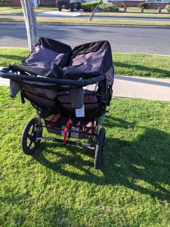 Double BOB Stroller (Category: Prams, Strollers & Car Seats) located in Brighton. Submitted by briannawilliams (Listing ID 1006375741, Image 2). Description: condition: good make / manufacturer: BOB model name / number: Double BOB Stroller I am selling my Double BOB stroller. It is in good working condition. It comes with parent console and snack tray. There is small tear in the footrest but does not impact use of stroller. The stroller was manuf