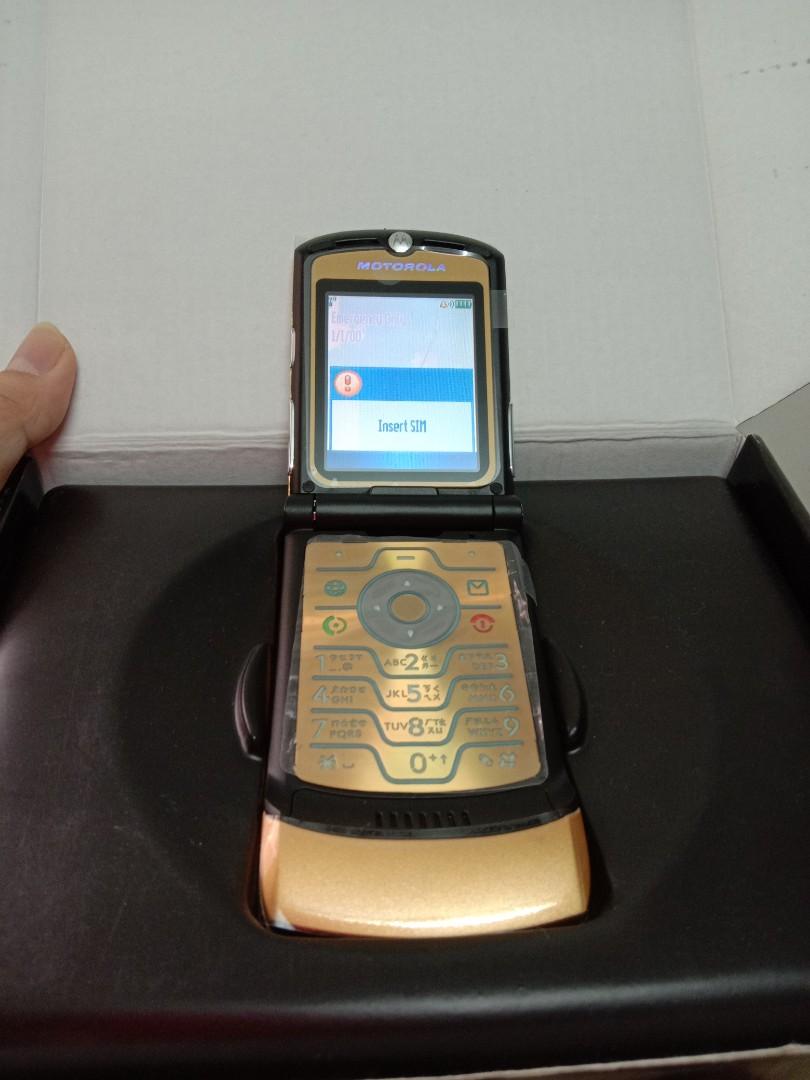 Elegant Motorola V3i Gold (Category: Android Others) located in Manila. Submitted by mixxstuffsshop (Listing ID 1006221550, Image 3). Description: 📱FOR SALE !! ELEGANT CLASSIC FLIP PHONE📱 👉NEW MOTOROLA RAZR V3i GOLD 👉 PHP 4,799 each *Old New stock *stylish Ultra - Thin Razr GOLD *Classy and Elegant *Comes with Charger and Box PM ME FOR THOSE INTERESTED..