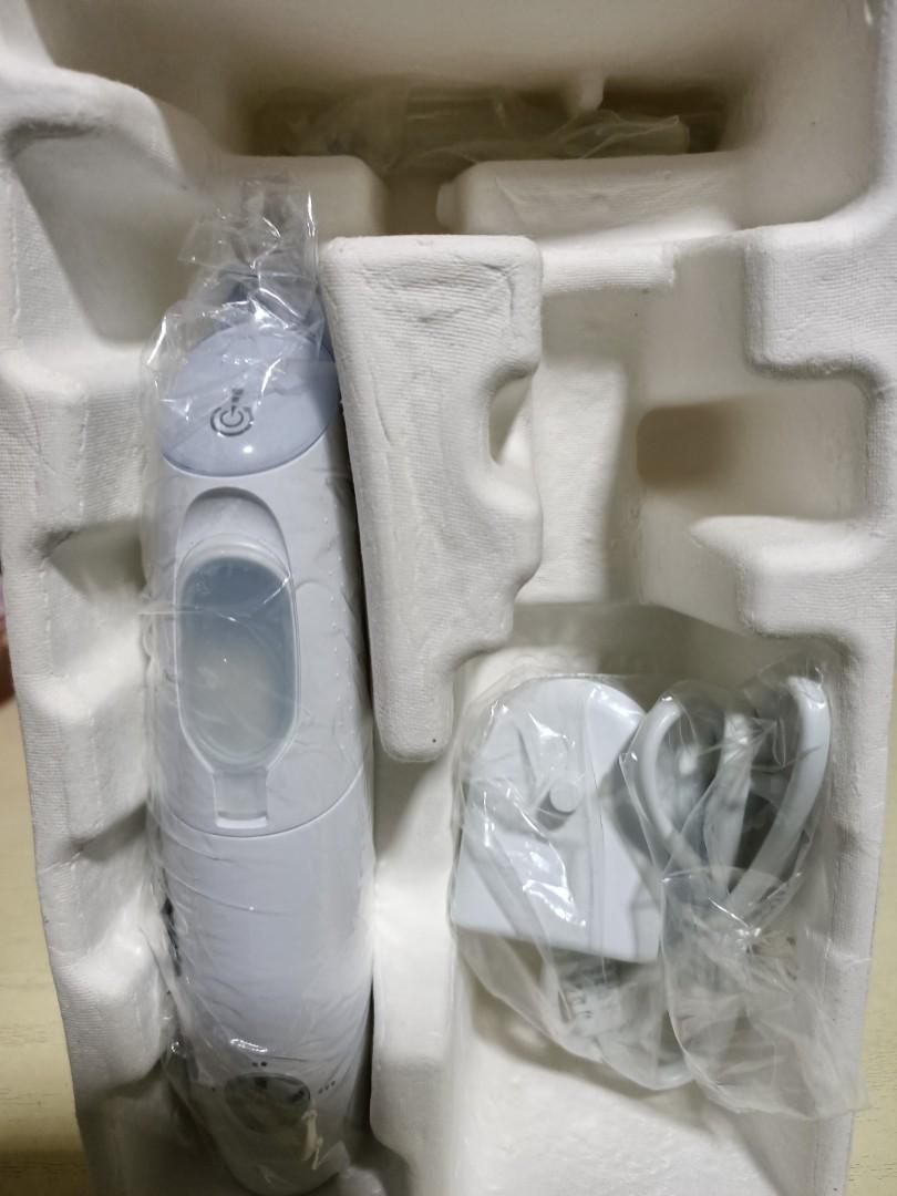 Irrigador bucal online airfloss ultra sonicare