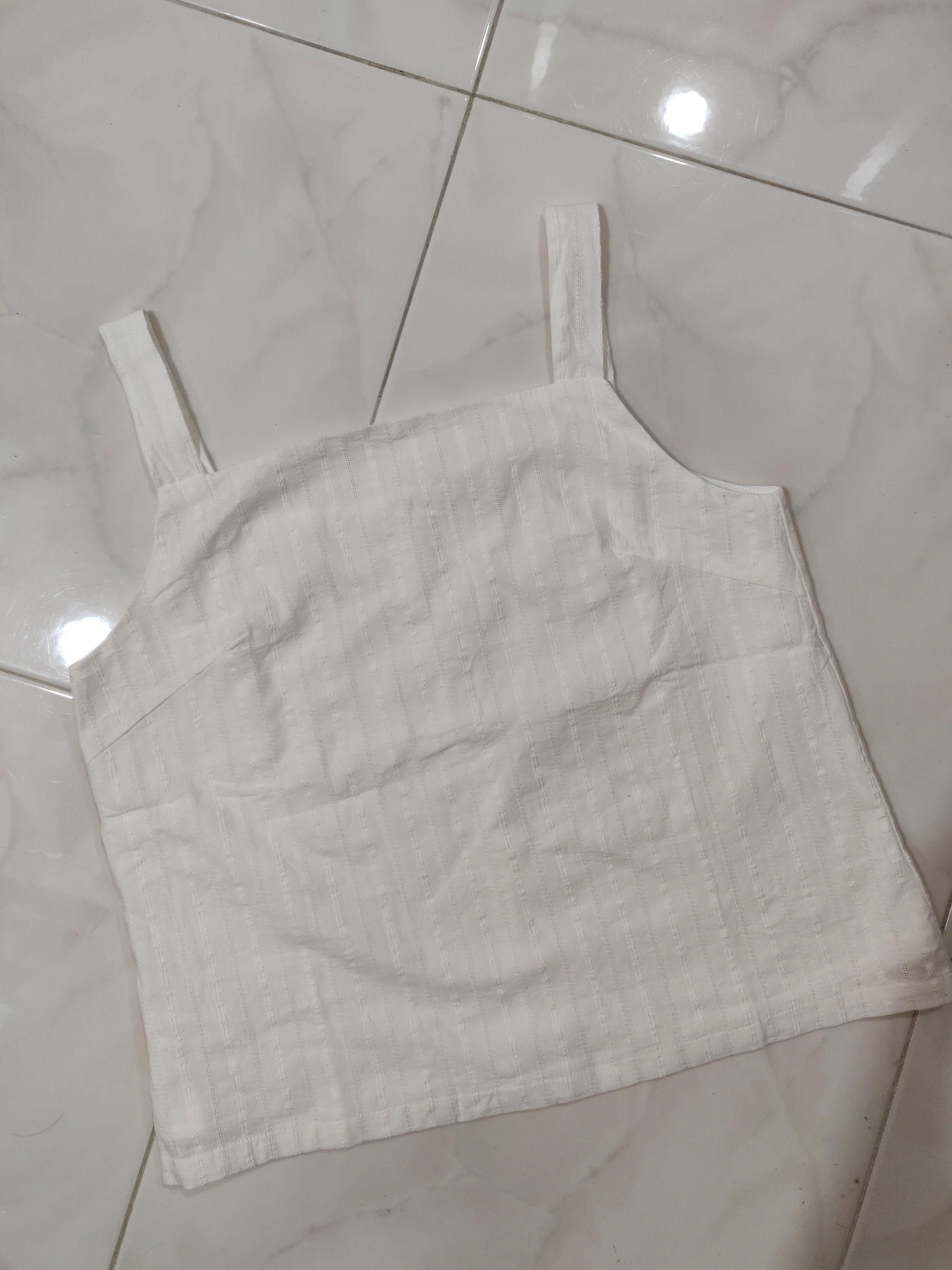 TheTinselRack - Lexa Basic Top (Category: Sleeveless) located in Singapore. Submitted by stonyfruit (Listing ID 1006315721, Image 1). Description: TheTinselRack's Embroidered Lexa Basic Top in White and Navy - Sized L! New and unworned, only tried twice. Bought it but unfortunately does not fit me as expected. It's a new release, hence the higher price point ($29.90) but I'm letting go with $10 discount each! Measurements (for both): L-sized Ches