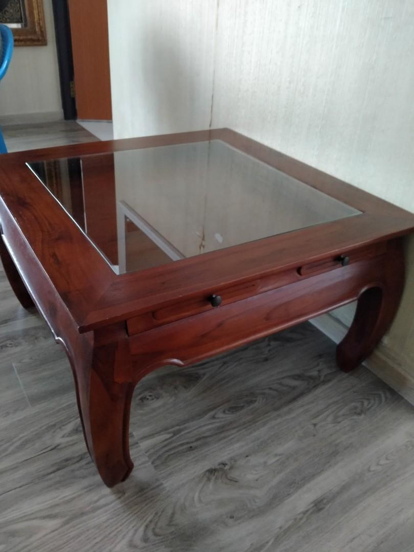 Coffee table (Category: Tables & Sets) located in Singapore. Submitted by mamanlyn (Listing ID 1006401611, Image 1). Description: Teak wood.