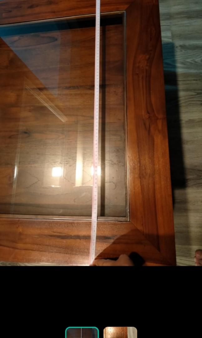 Coffee table (Category: Tables & Sets) located in Singapore. Submitted by mamanlyn (Listing ID 1006401611, Image 2). Description: Teak wood.