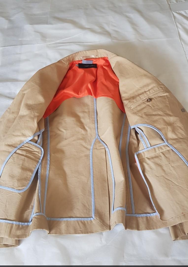 Dsquared (Category: Tshirts & Polo Shirts) located in Singapore. Submitted by glam380 (Listing ID 1006480966, Image 3). Description: 1. DSUARED denim jacket (100% cotton). Inside lining polyester. 2. Original authentic branded . Beige color with 4 front pockets. 3. Size 46. Genuine made in Italy. 4. Condition: 8/10.
