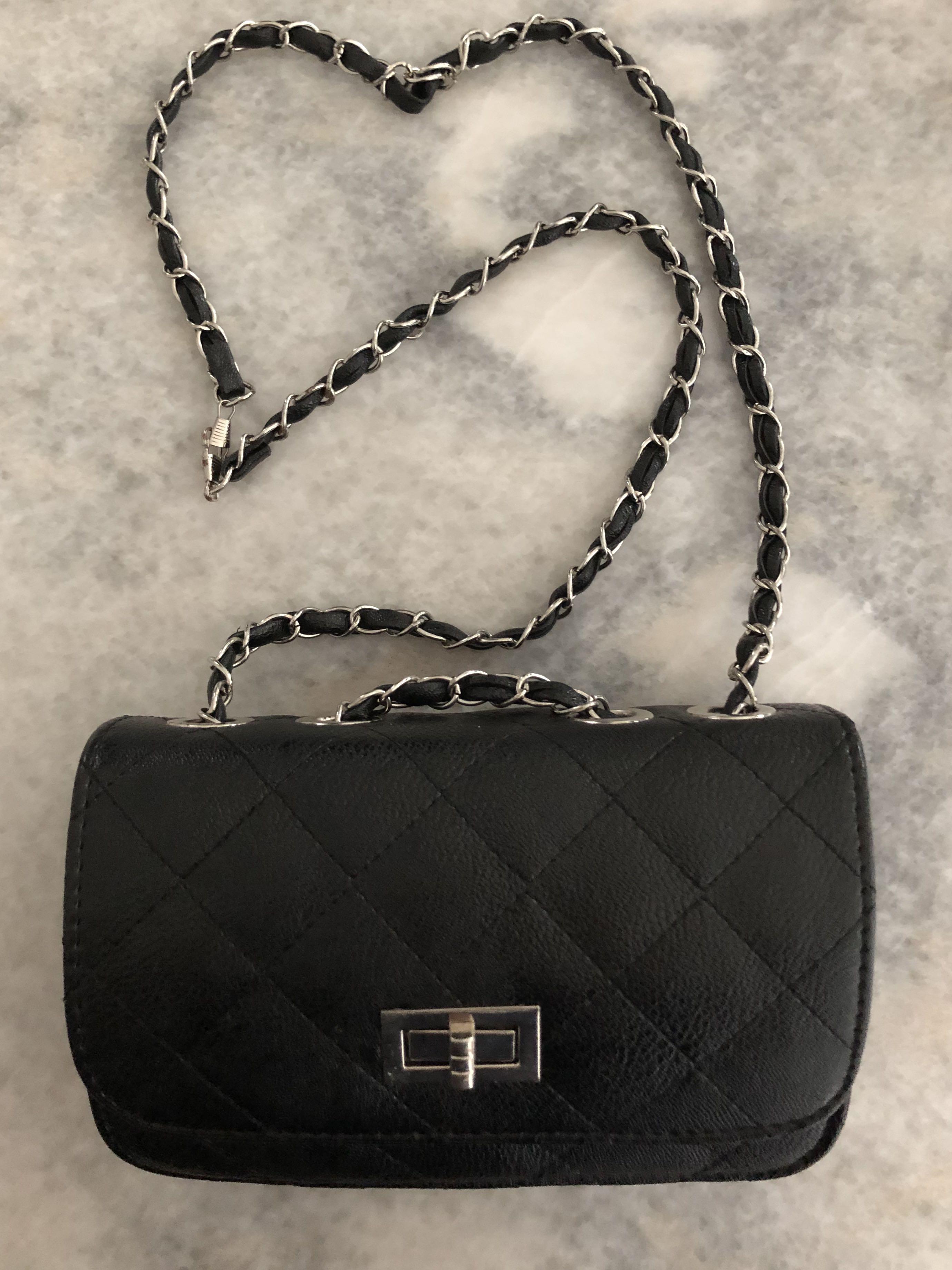 black sling bag with silver chain