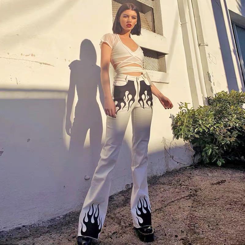 white jeans with black flames