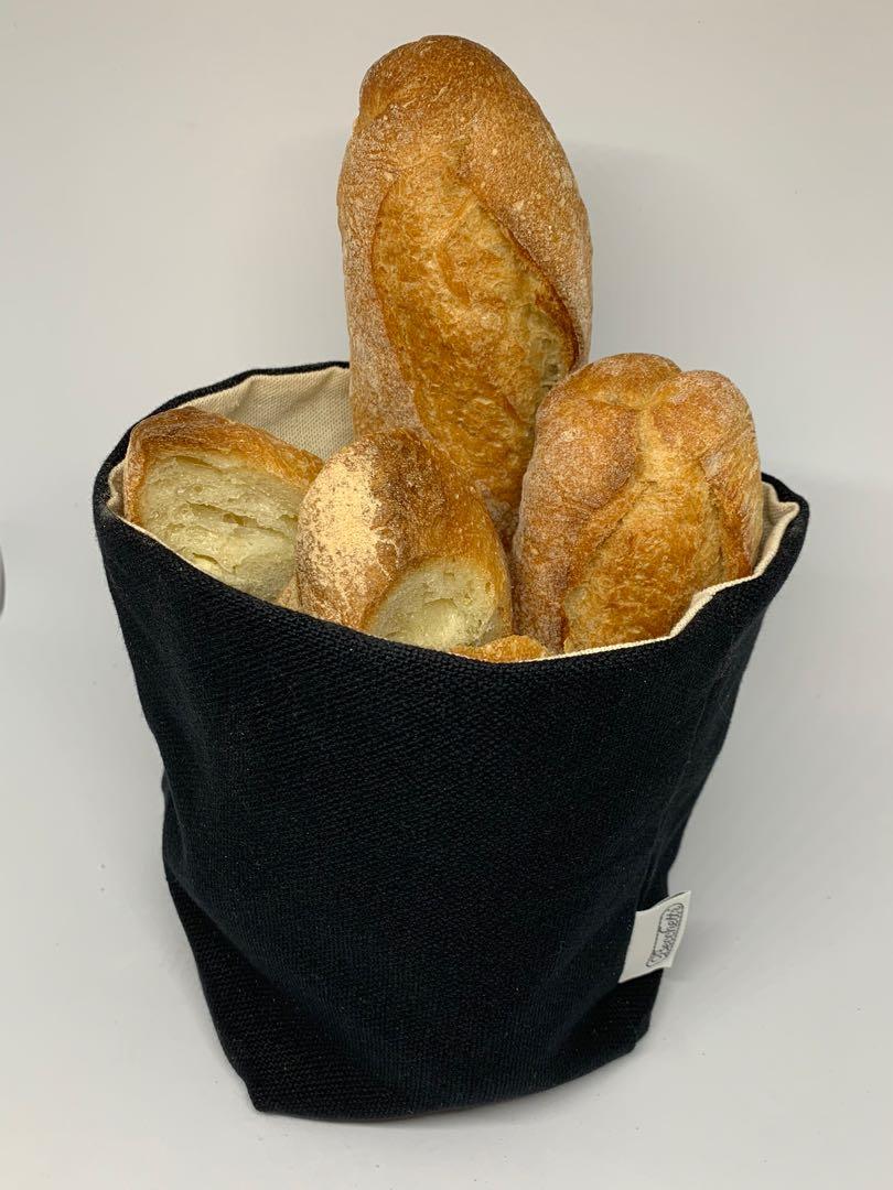 Bread Baskets (Category: Food Organisation & Storage) located in Singapore. Submitted by midview04131 (Listing ID 1006712213, Image 1). Description: Square bread basket or bag handmade from the finest Italian cotton. Placing the basket in microwave for 2 mins gives you warm bread all meal long - thanks to cherry stones at the bottom that pick up heat quickly & release it slowly. 2 pieces left. Washing machine safe. Dimensions: 5” x 5” x 6” .