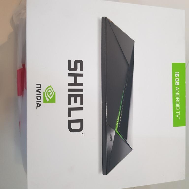 Nvidia shield with controller (Category: TV Parts & Accessories) located in Singapore. Submitted by ella97 (Listing ID 1006641853, Image 1). Description: All good condition and also still have protection sheet on..