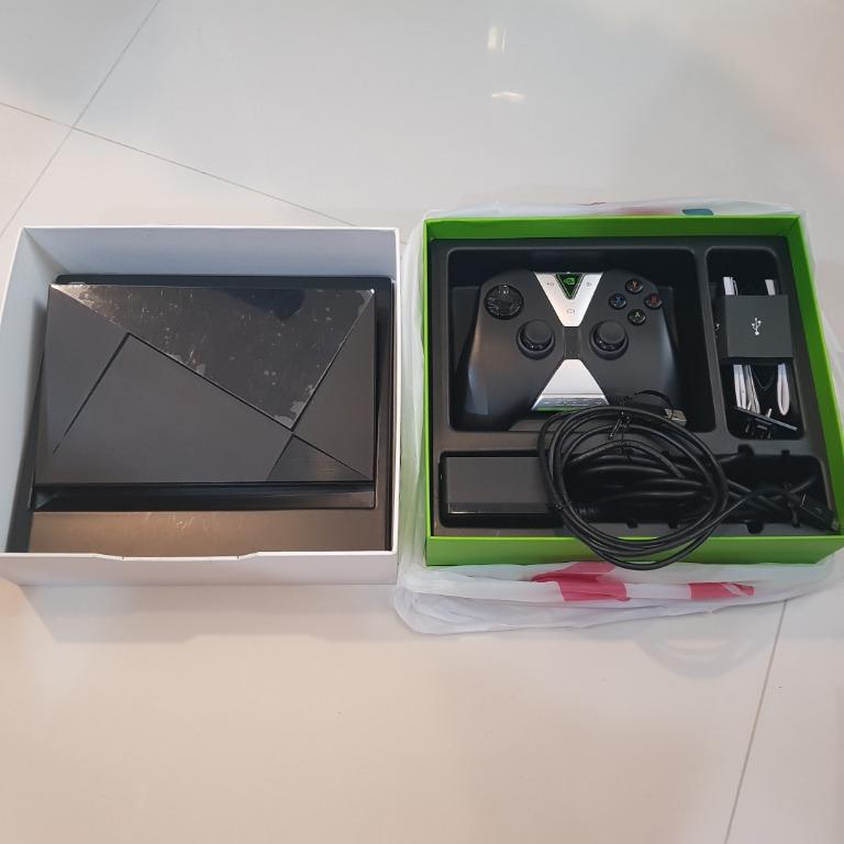 Nvidia shield with controller (Category: TV Parts & Accessories) located in Singapore. Submitted by ella97 (Listing ID 1006641853, Image 3). Description: All good condition and also still have protection sheet on..