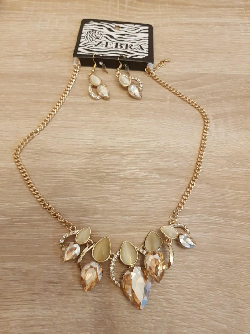 Gold statement sale necklace and earrings