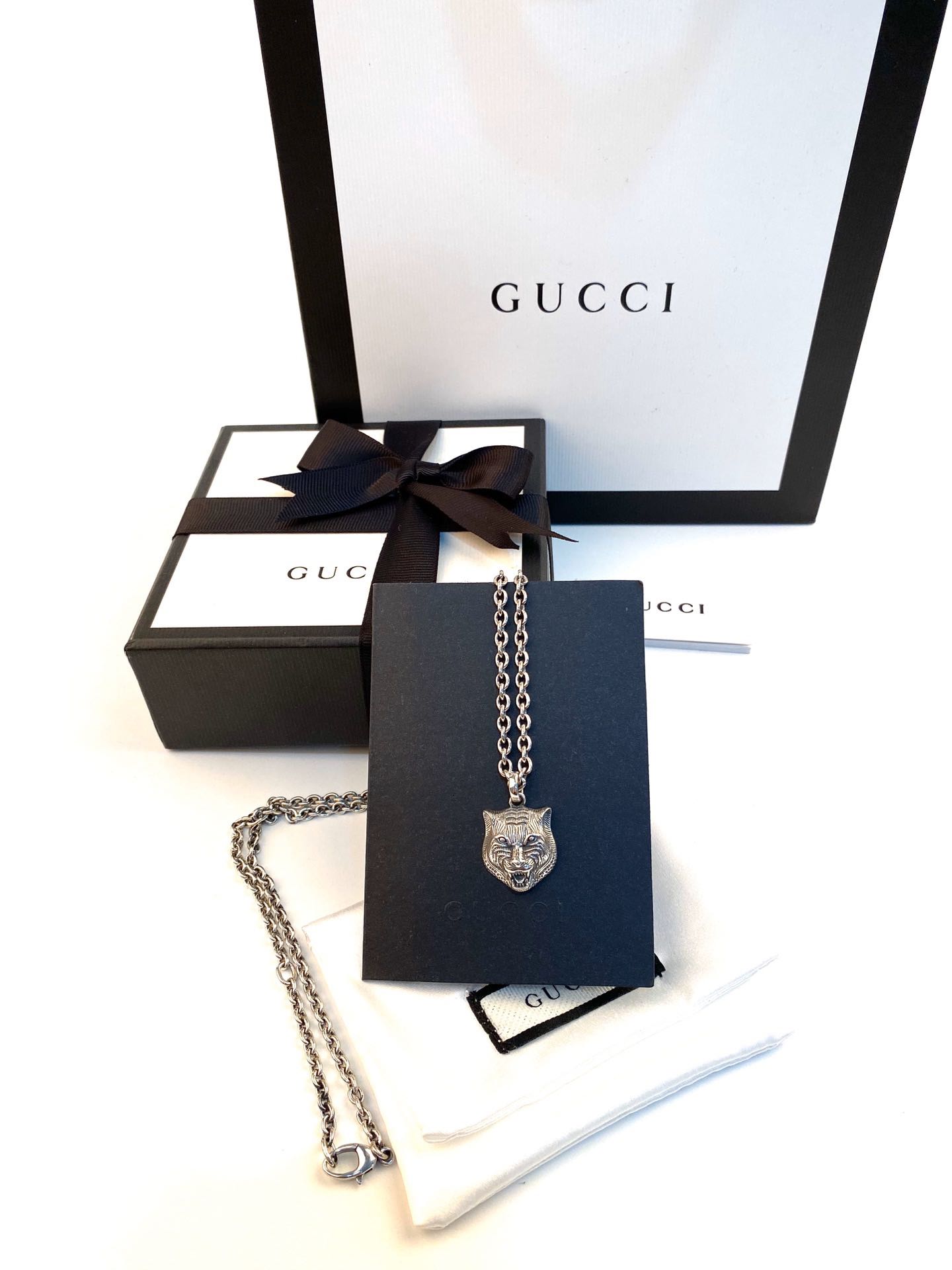 necklace in silver with feline head