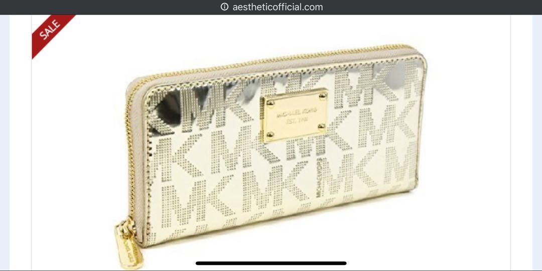 Mk deals gold wristlet