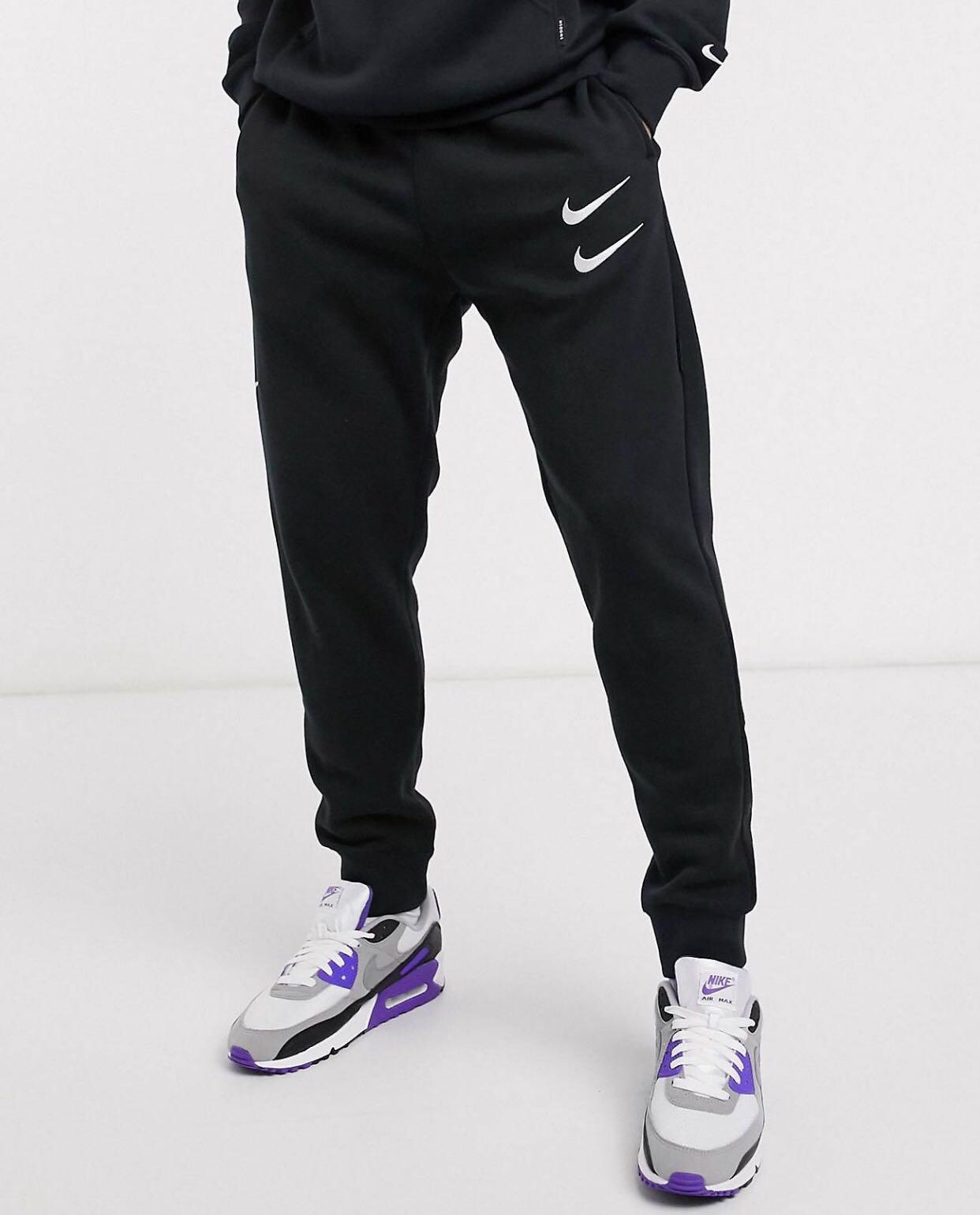 double nike tick joggers