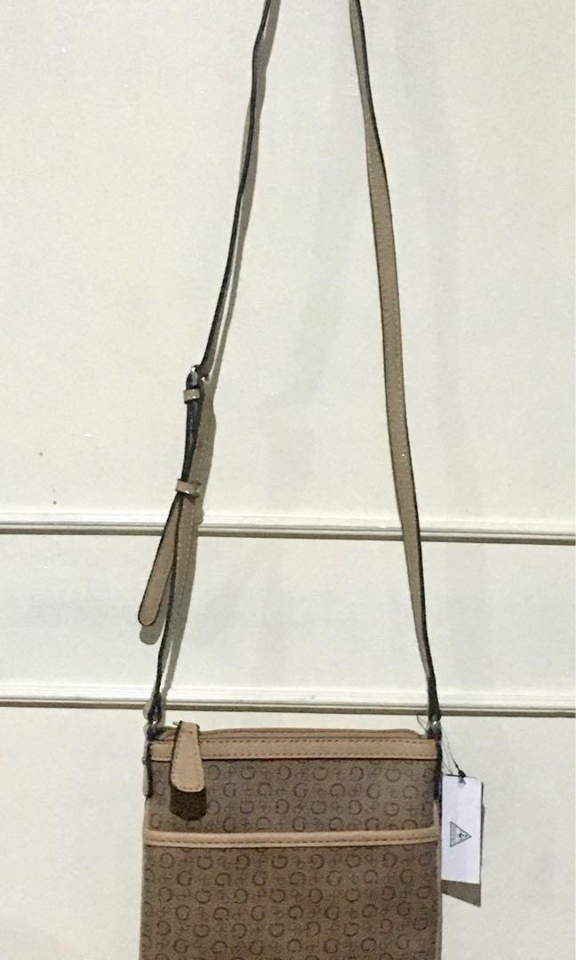 Original Guess Sling Bag (Category: Cross-body Bags) located in Quezon City. Submitted by declutter_project (Listing ID 1007200946, Image 1). Description: Color: Mocha.
