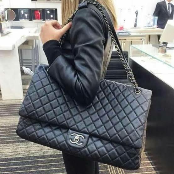 Premium Chanel Xxl jumbo travel bag, Luxury, Bags & Wallets on Carousell