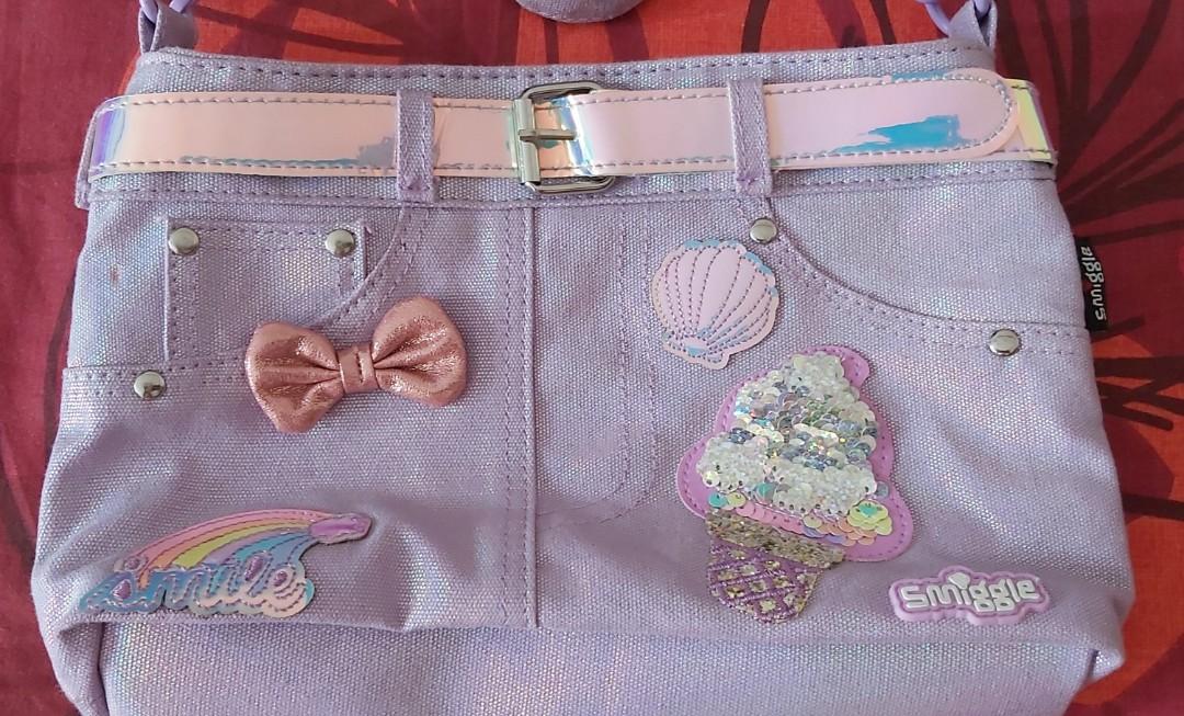VGUC-EUC Smiggle kids cross body bag (Category: Diaper Bags & Wetbags) located in Bacoor. Submitted by sorinmarkov (Listing ID 1007103031, Image 2). Description: For Sale Only EUC-VGUC Smiggle Kids cross body bag Bought from Australia dimension: 11 x 6 1/2 x 2 1/2 inches strap length: shortest: 27inches longest: 50inches flaw: with small stain (pls see last pic) firm on price No free Sf Lalamove only MOP: BPI, BDO, Lalamove Purchase service (COD)