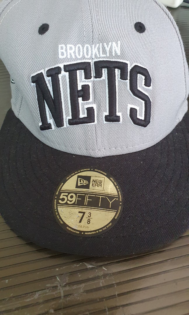 new era 7 cap