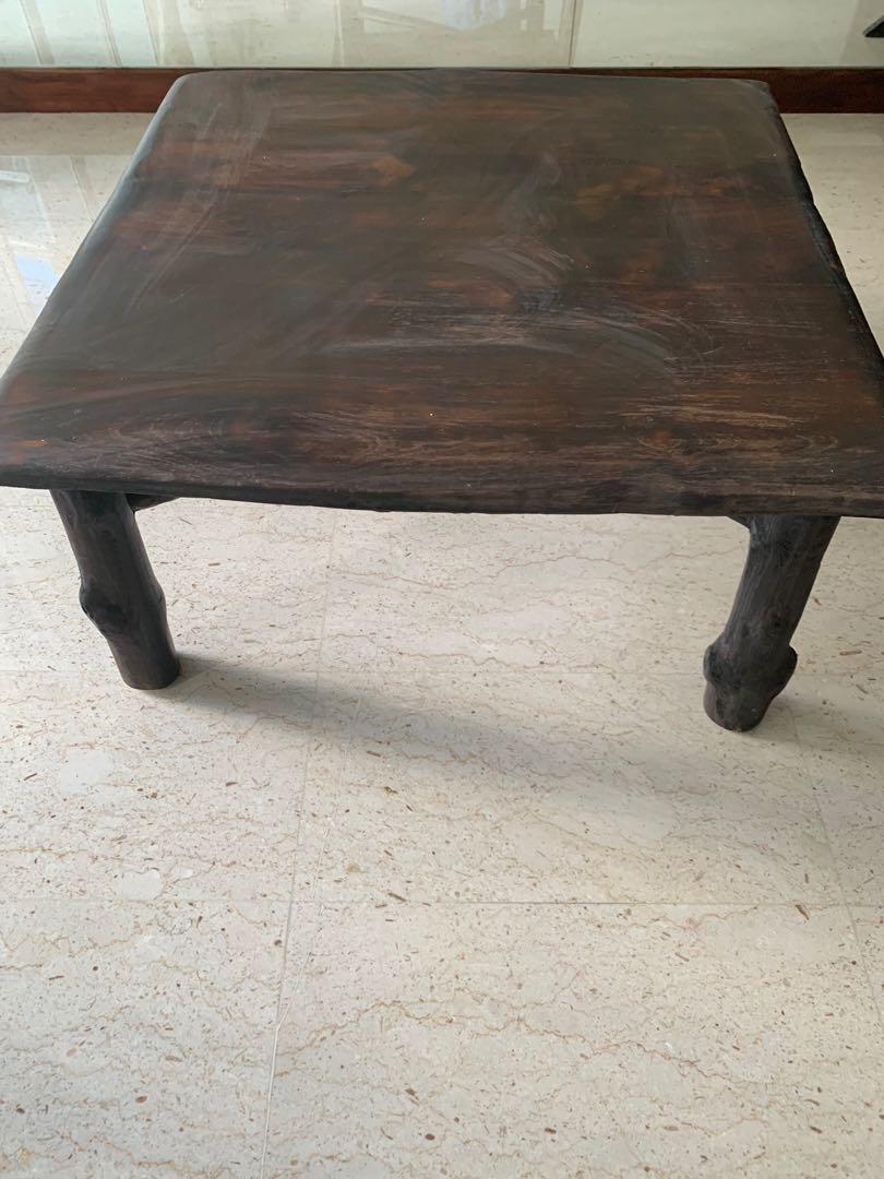 Solid timber coffee table (Category: Tables & Sets) located in Singapore. Submitted by zacka (Listing ID 1003842709, Image 2). Description: 1m by 1m Perfect for big living rooms Self collect at phoenix garden or west coast drive.